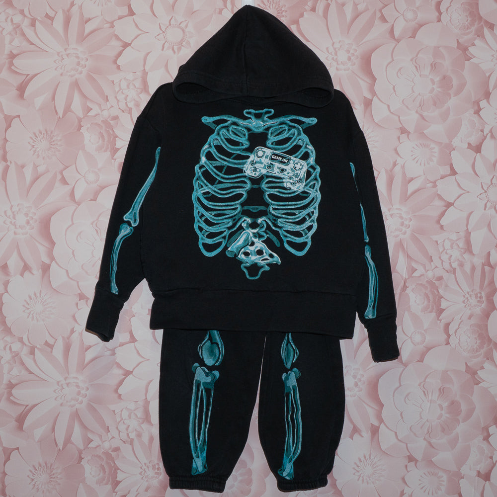 Skeleton Track Suit Size 5