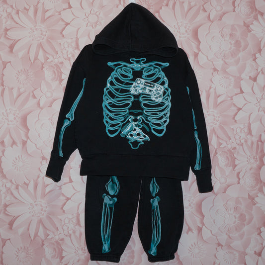 Skeleton Track Suit Size 5